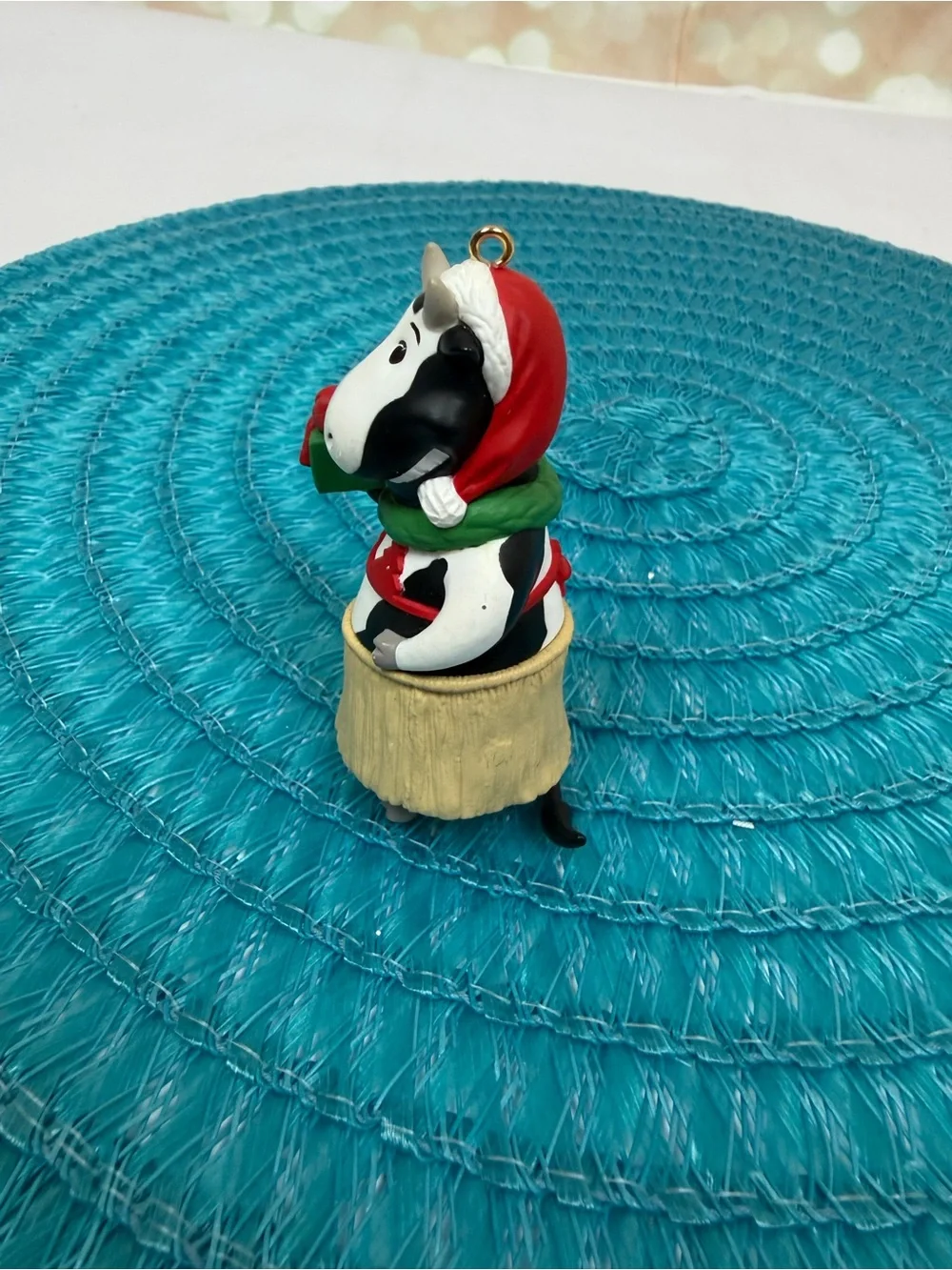 Hallmark White and Black Cow Ornament with Red and Green Gift